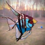 finished Angel Fish suncatcher hanging in a window