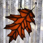 finished Oak Leaf suncatcher backlit