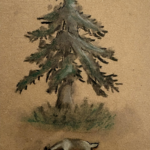 A deer grazing in front of an evergreen tree with lush grass at its base